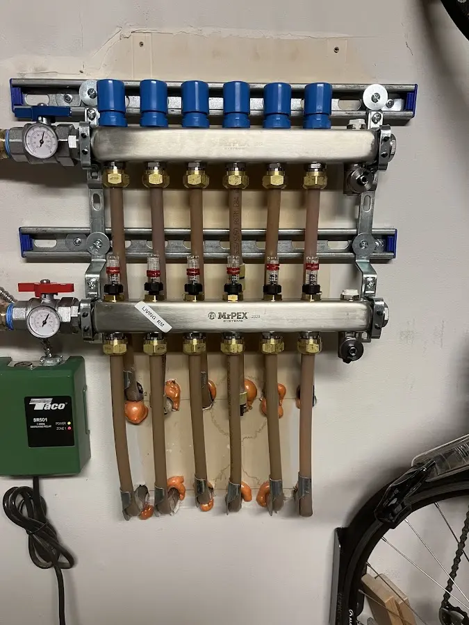 Plumber performing Gas Line Installation at a residential property in Freeport